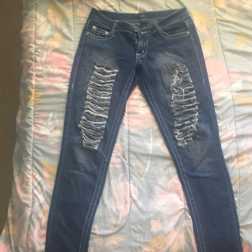 Dark blue ripped jeans